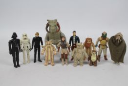 Star Wars - Kenner - LFL - A squad of 12 loose vintage Star Wars figures.