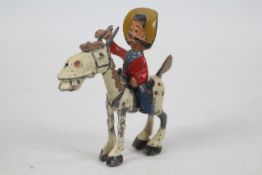 Sacul - An unboxed early 1950's 'Hank and Silver King' figure.