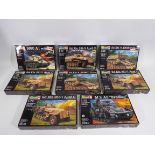 Revell - A fleet of eight boxed plastic model military vehicles kits in 1:72 scale by Revell.