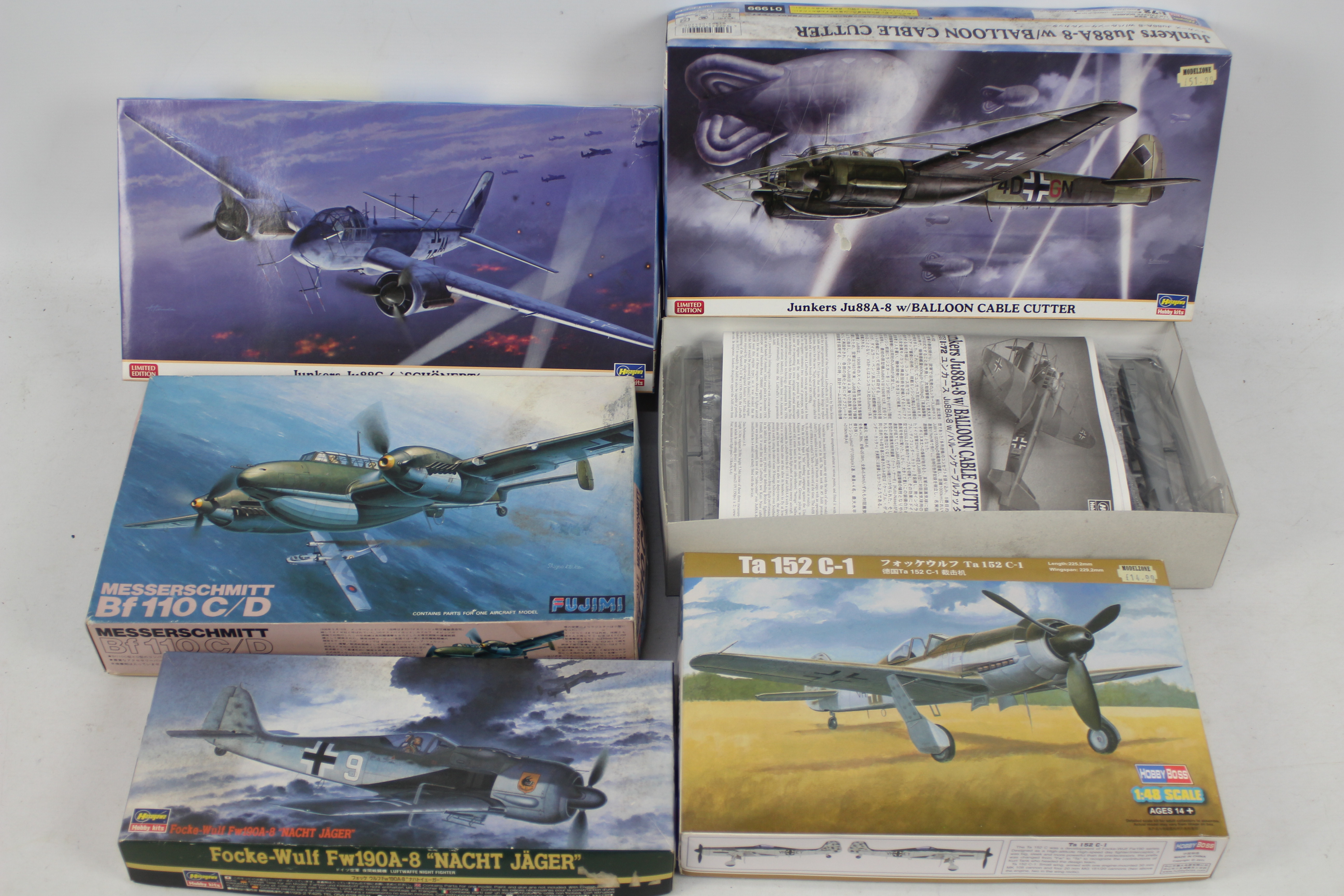 Hasegawa - Fujimi - HobbyBoss - Fived boxed plastic model aircraft kits in various scales.