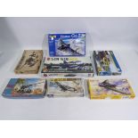 Revell - PM Model - Italeri - Other - Seven boxed plastic model kits in various scales.
