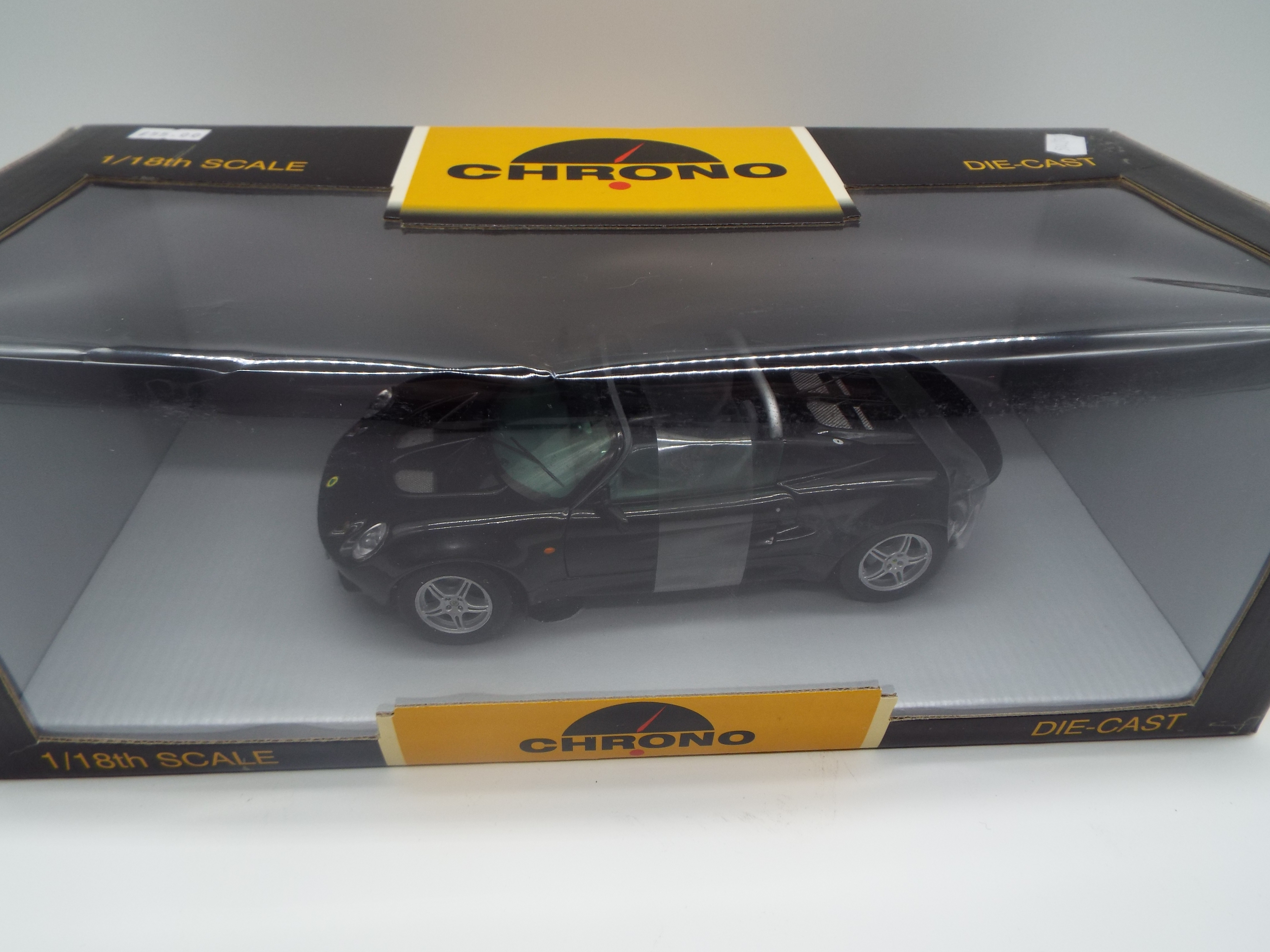 Chrono - a 1:18 scale model diecast racing car, Lotus Elise GT1 1997 black,