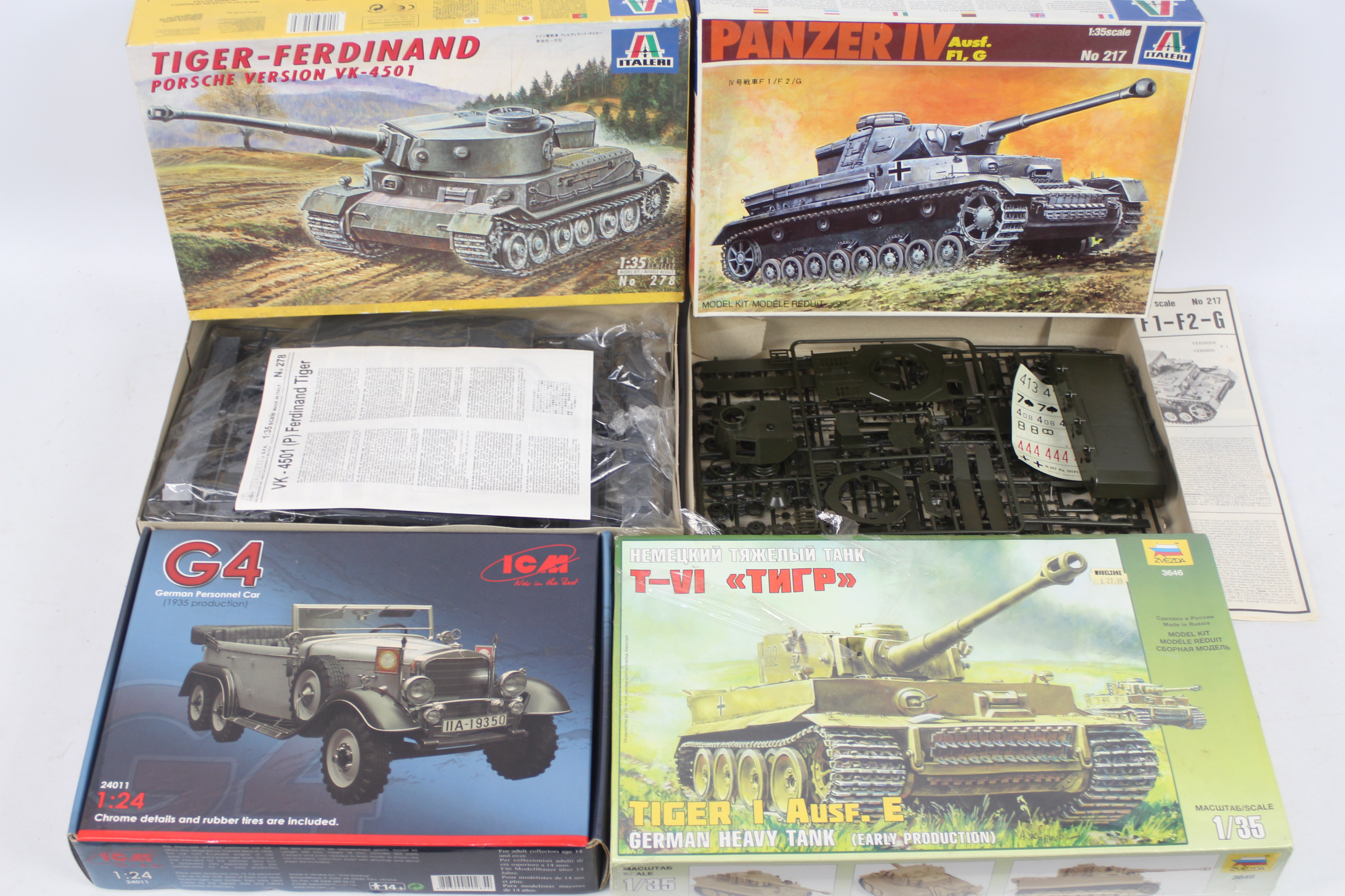 ICM - Italeri - Zvezda - Four boxed plastic military vehicle model kits.