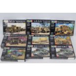 Revell - Nine boxed plastic model military vehicles kits in 1:76 scale by Revell.