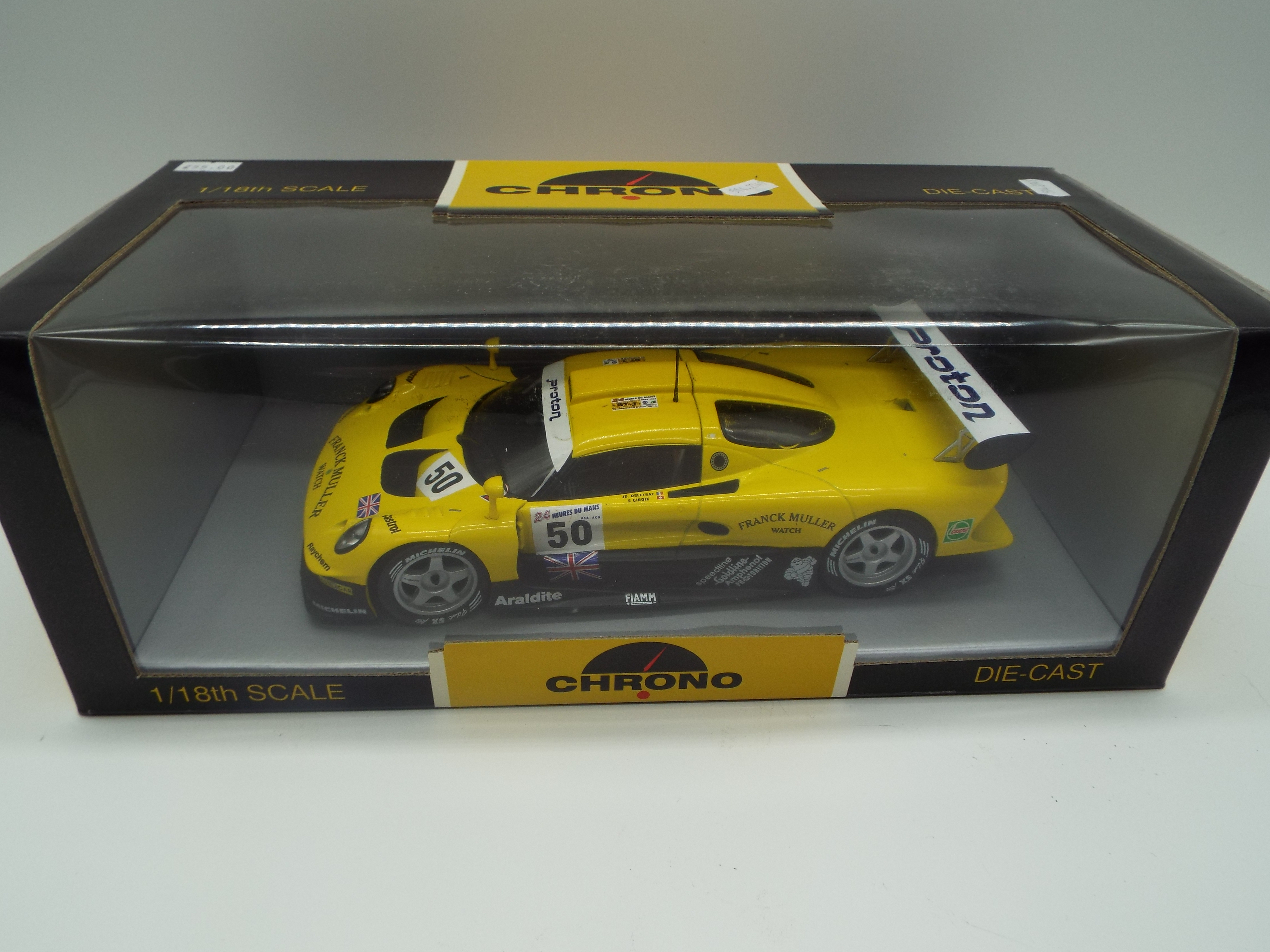 Chrono - a 1:18 scale model diecast racing car, Lotus Elise GT1 Franck Muller 1997 yellow # H1070,