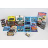 Corgi - Matchbox - Base Toys - Oxford - A group of 26 x boxed / carded models including 1933 Ford