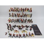 A collection of various cast metal figures by Britains, Timpo and other,