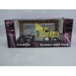 Revell - A boxed #08893 1:24 scale Revell die-cast truck - The Peterbilt 359 truck appears in