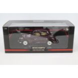 Minichamps - A boxed 1:18 scale Morris Minor 1000 in maroon # 137002.