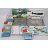 Tamiya - Airfix - Hasegawa - Seven boxed and bagged Spitfire plastic model kits in 1:72 and 1:48