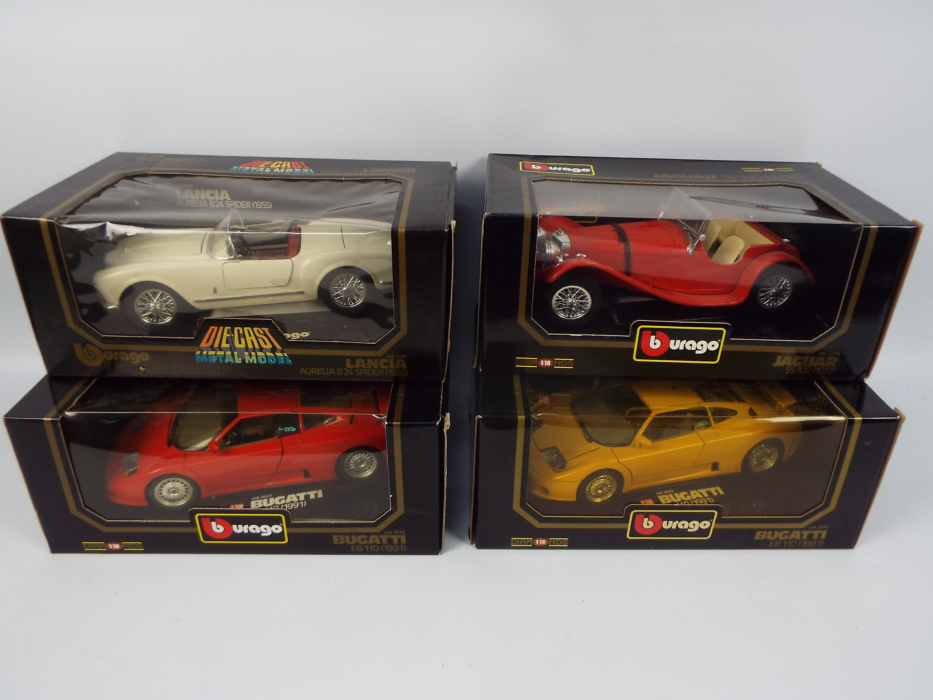 Bburago - Four boxed 1:18 scale diecast model cars from Bburago.