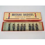 Britains - A boxed set of 8 x Grenadier Guards in Winter Overcoats # 312.