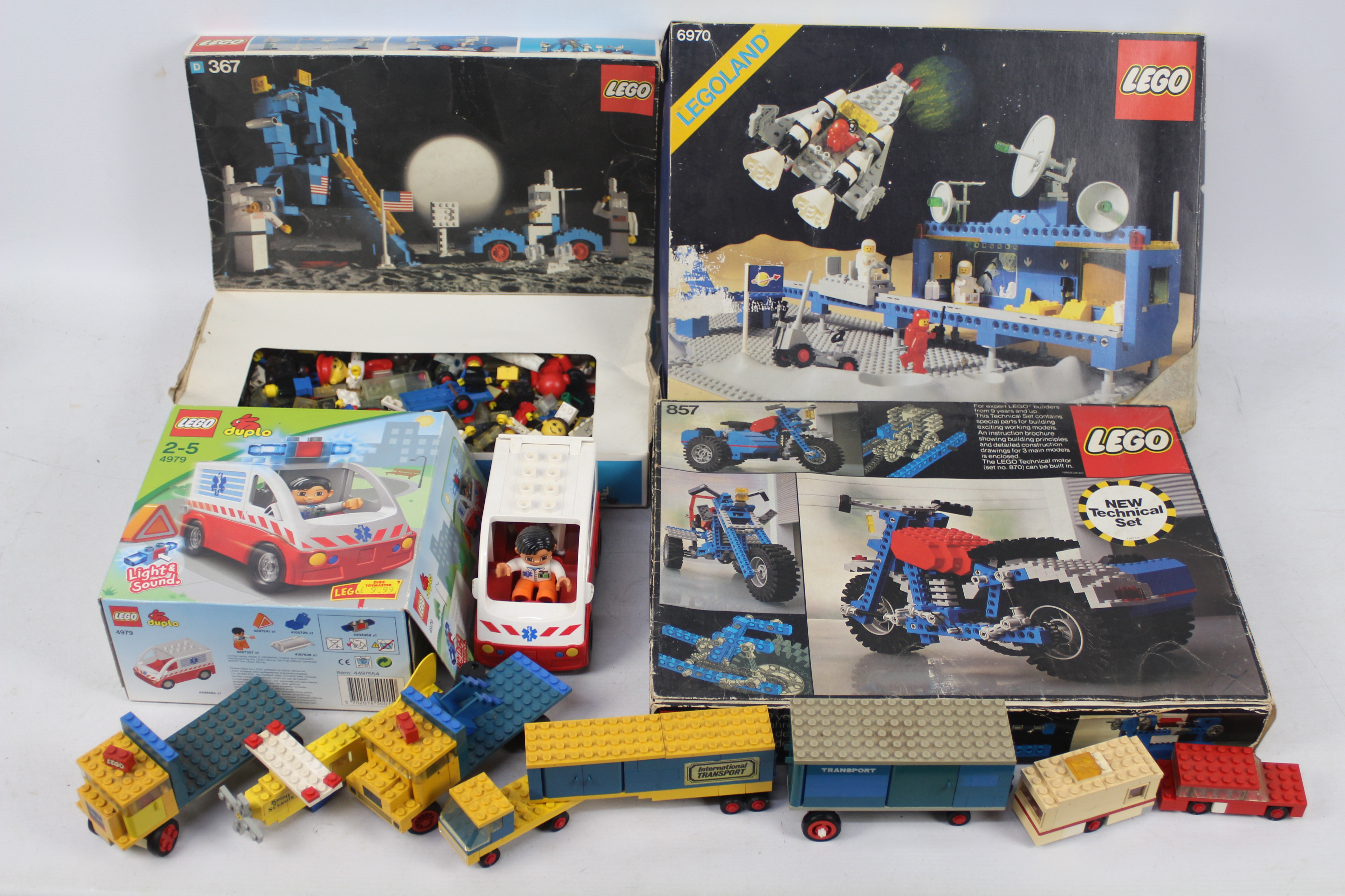 Lego - 3 x vintage Lego boxed sets, Moon Landing set dated 1975, Space Centre dated 1981,