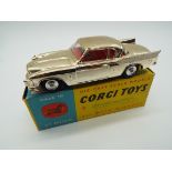 Corgi - a diecast model Studebaker 'Golden Hawk' metallic gold body, red interior, grey chassis,