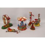 Tinplate - A unboxed collection of five modern German and Chinese tinplate toys.