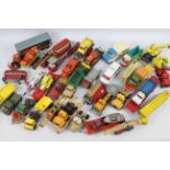 Dinky Toys - Matchbox - Corgi Toys - A large unboxed group of diecast model vehicles.