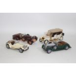 Franklin Mint - Four Franklin Mint diecast 1:24 scale model vehicles.