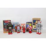 Tinplate Robots - A collection of five boxed modern Chinese made Tinplate toy robots.