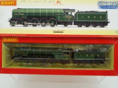 Hornby - an OO gauge model 2-8-2 locomotive and tender, label on box indicates DCC fitted,