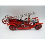 Mamod - a live steam 1404 Fire Engine FE1, depicting an Edwardian machine,