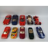 Bburago - A fleet of unboxed Bburago die-cast model cars in various scales.