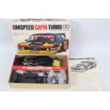 Tamiya - A boxed Zakspeed Capri Turbo model kit in 1:24 scale.