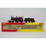 Hornby - an OO gauge model 4-2-2 locomotive and tender, running no 14010,