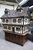 Charles Jenner Dolls House - A large Tudor style wooden dolls house attributed to Charles Jenner of