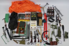 Palitoy - Hasbro - Action Man - An unboxed group of vintage Action Man weapons and accessories.