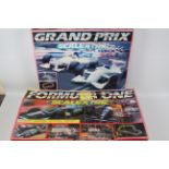 Scalextric - Formula One - Grand Prix. Two boxed sets of Scalextric.