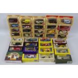 Lledo - 36 x boxed models including Morris Minor Van # 69000, Austin Taxi # 47000,