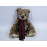 Charlie Bear - A Charlie Bear entitled Adam CB194557, comes with name tag, approximately 34 cm (h).