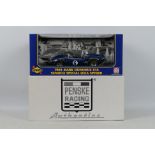 GMP - A boxed 1966 Mark Donohue number 16 Sunoco Special Lola Spyder in 1:18 scale,