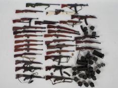 Dragon - DiD - A loose collection of 1:6 scale action figure weapons and accessories,