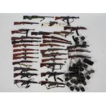 Dragon - DiD - A loose collection of 1:6 scale action figure weapons and accessories,