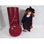 H. Samuel - A 'The Christmas 2000' limited edition Porcelain doll by H.