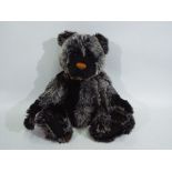 Charlie Bear - A Charlie Bear entitled Griffin CB104730, comes with name tag,