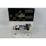 Exoto - Grand Prix Classics - A boxed 1976 Tyrrell P34 6 Wheeler F1 car in aluminum finish # 97047.