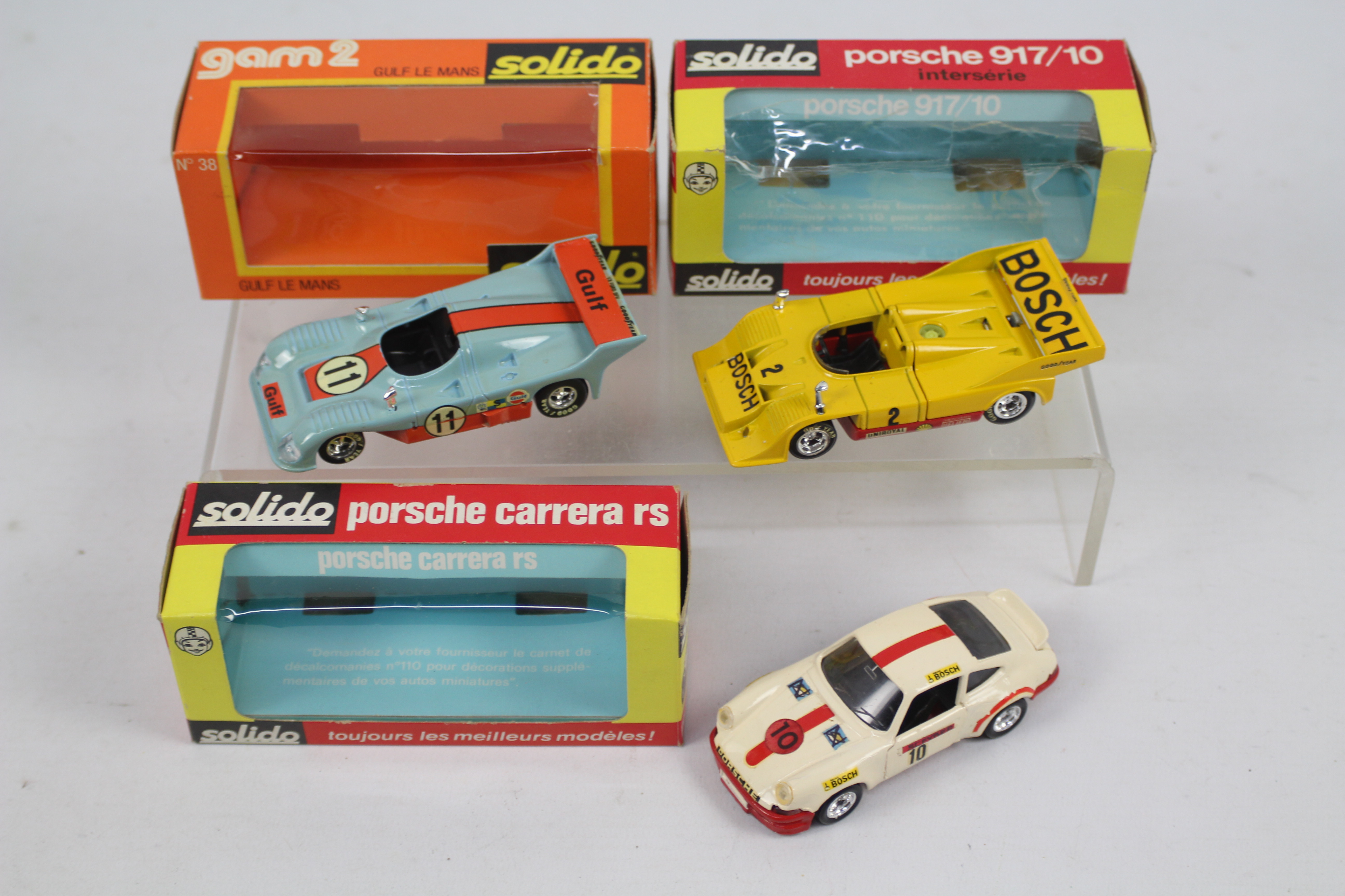 Solido - 3 x boxed models #18b Porsche 917/10 No.38 Gulf Le Mans 1975 #24 Porsche Carrera RS.