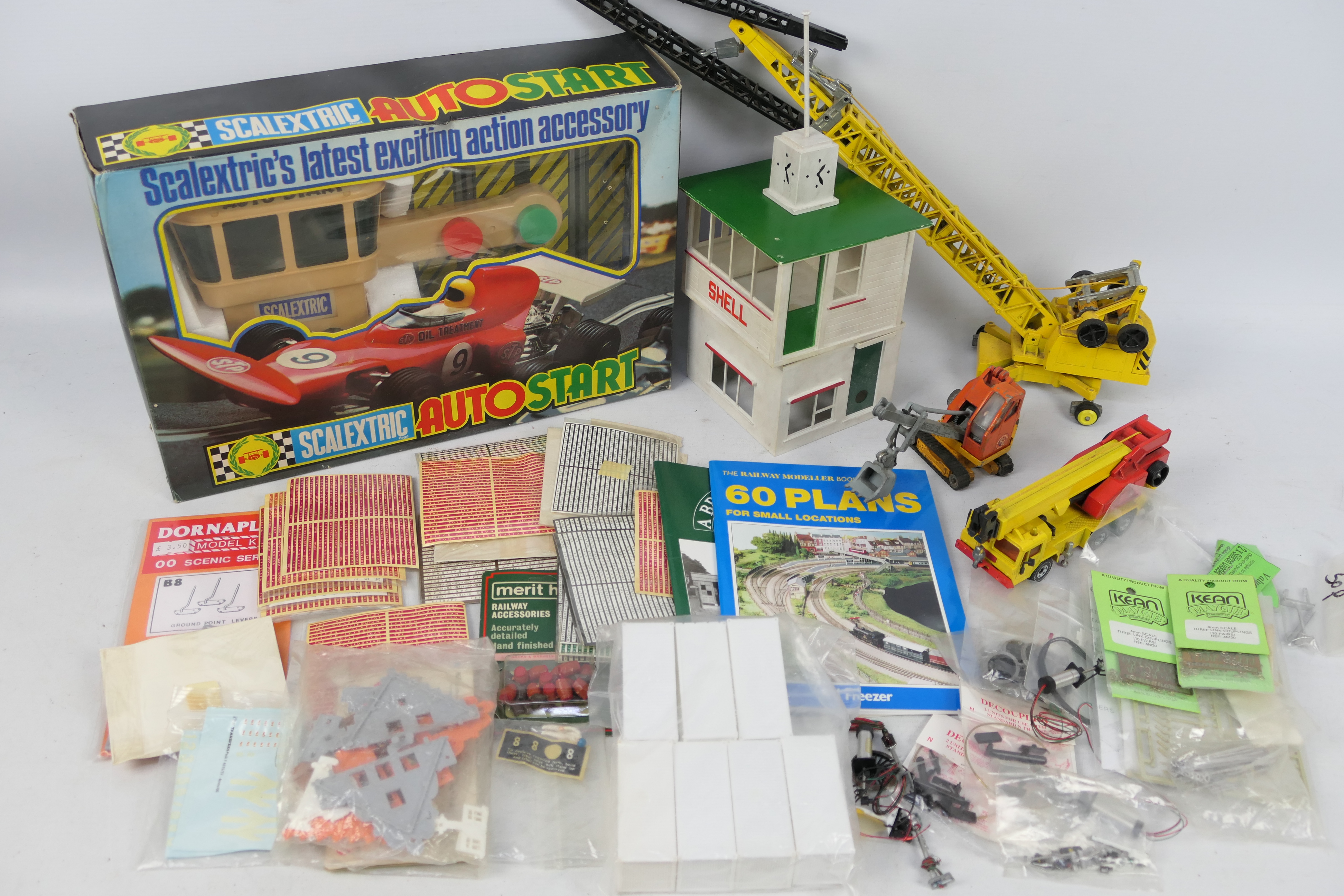 A large selection of loose and boxed model railway and diecast items including decals,