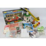 A large selection of loose and boxed model railway and diecast items including decals,