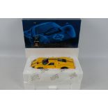 Exoto - Racing Legends - A boxed 1:18 scale Ford GT40 MkIV in yellow celebrating 100 years of Ford