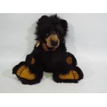 Charlie Bear - A Charlie Bear entitled Malcolm CB194201, comes with name tag,