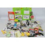 A large collection of N gauge scenery, spare parts, buildings, cars,