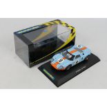 Scalextric - A boxed 1968 Ford GT40 number 9 car in Gulf livery # C2403.