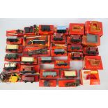 Hornby - Triang - Over 20 boxed Hornby / Triang OO gauge freight rolling stock wagons and model