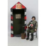 Dragon - An unboxed 1:6 scale Dragon Wehrmacht Feldgendarme sentry with custom built sentry box.