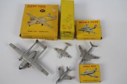 French Dinky Toys - Dinky Toys - A boxed trio of French Dinky aircraft with a Dinky Toys Trade box