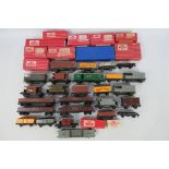 Hornby Dublo - Over 20 unboxed Hornby Dublo wagons with 11 EMPTY Hornby Dublo boxes.