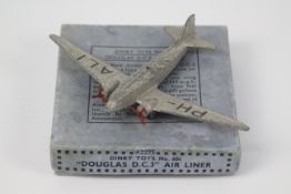 Dinky Toys - A boxed Dinky #60t Douglas DC3 Air Liner.
